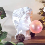 Lampe visage chewing-gum SEL