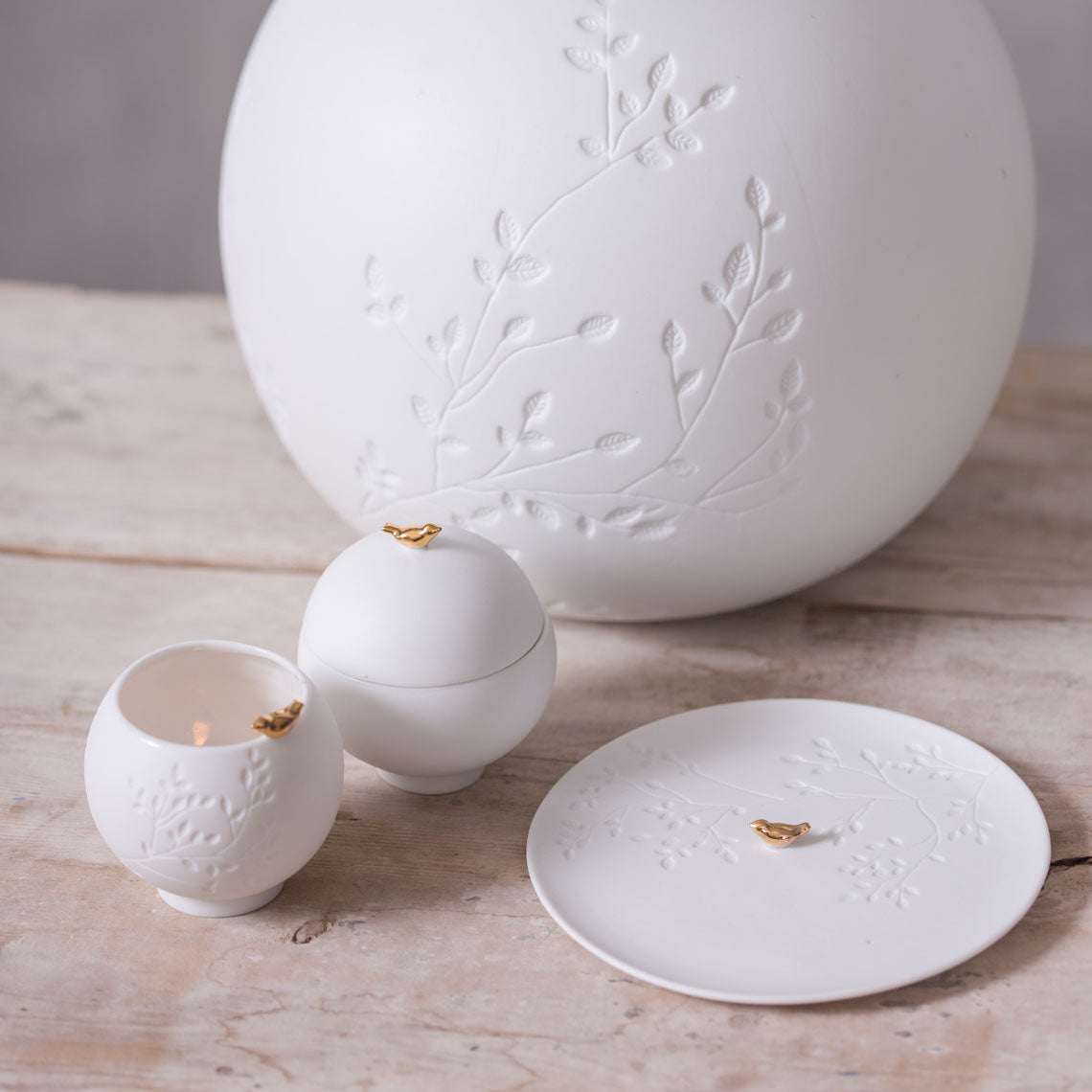 Photophore Oiseau doré porcelaine Rad